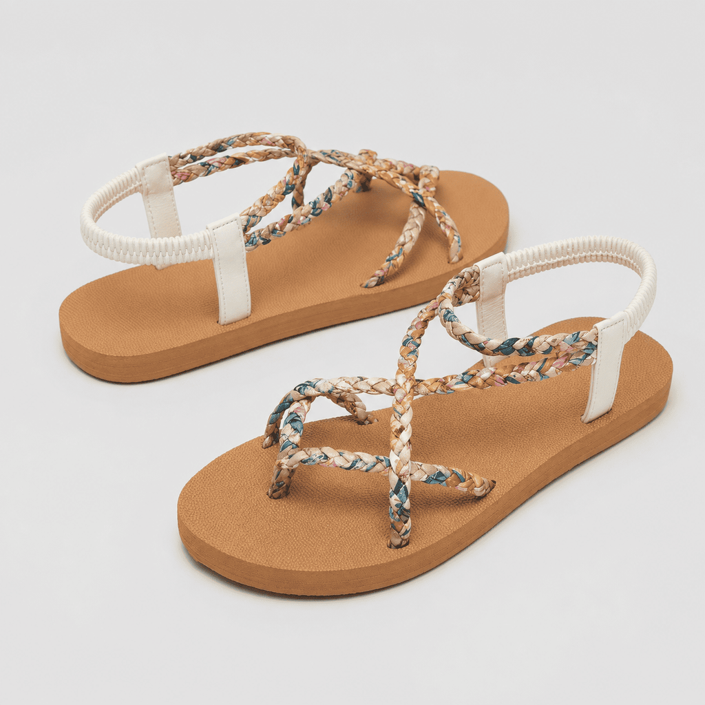 White boho strappy flat sandals angled view